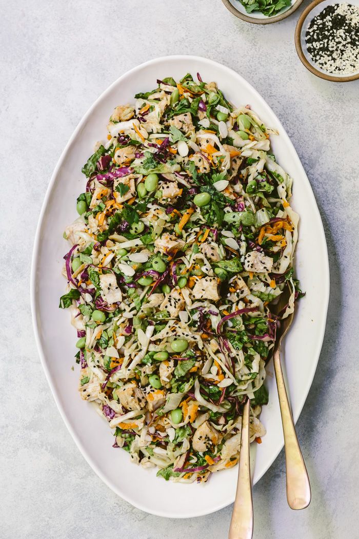 An Asian-Style chicken salad recipe made with green & red cabbage and lettuc...